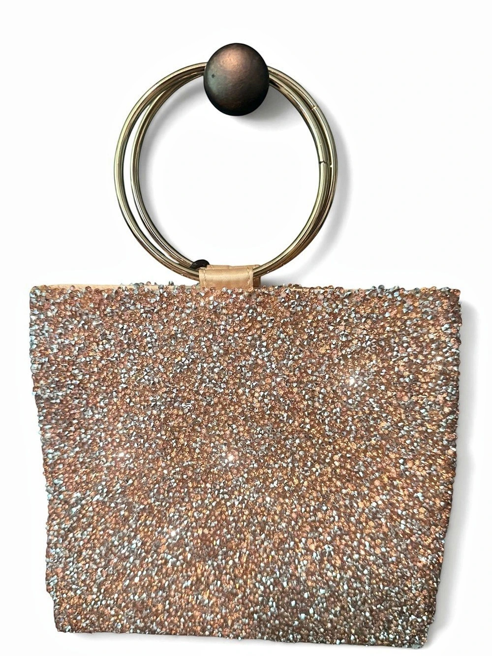 Olivia Miller Glitter Ring Handle Clutch in metallic silver, copper, and gold